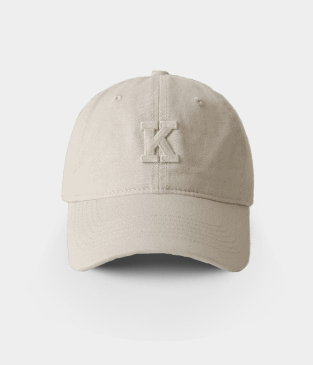 K.