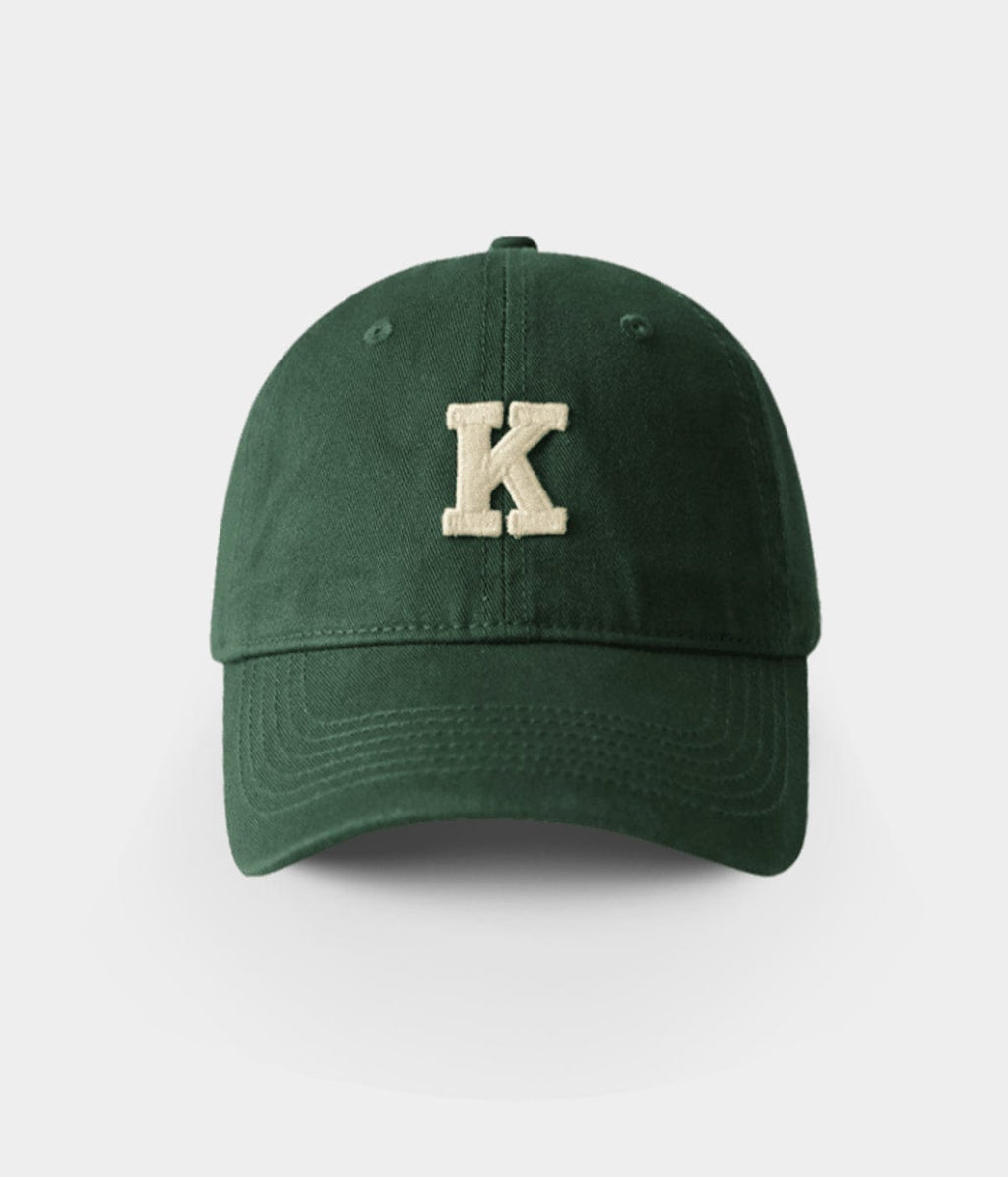 K.